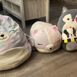Squishable snuggle characters, various sizes, and 7 big multicolor flower pillows.  $7 each or best offer!  $60. for everything 