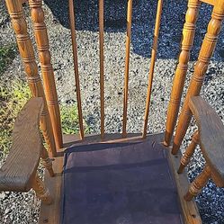 antique rocker real heavy wood in eccellant shape  cushion needs repair or replace