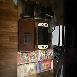 Nintendo switch Oled bundle with all original accessories 