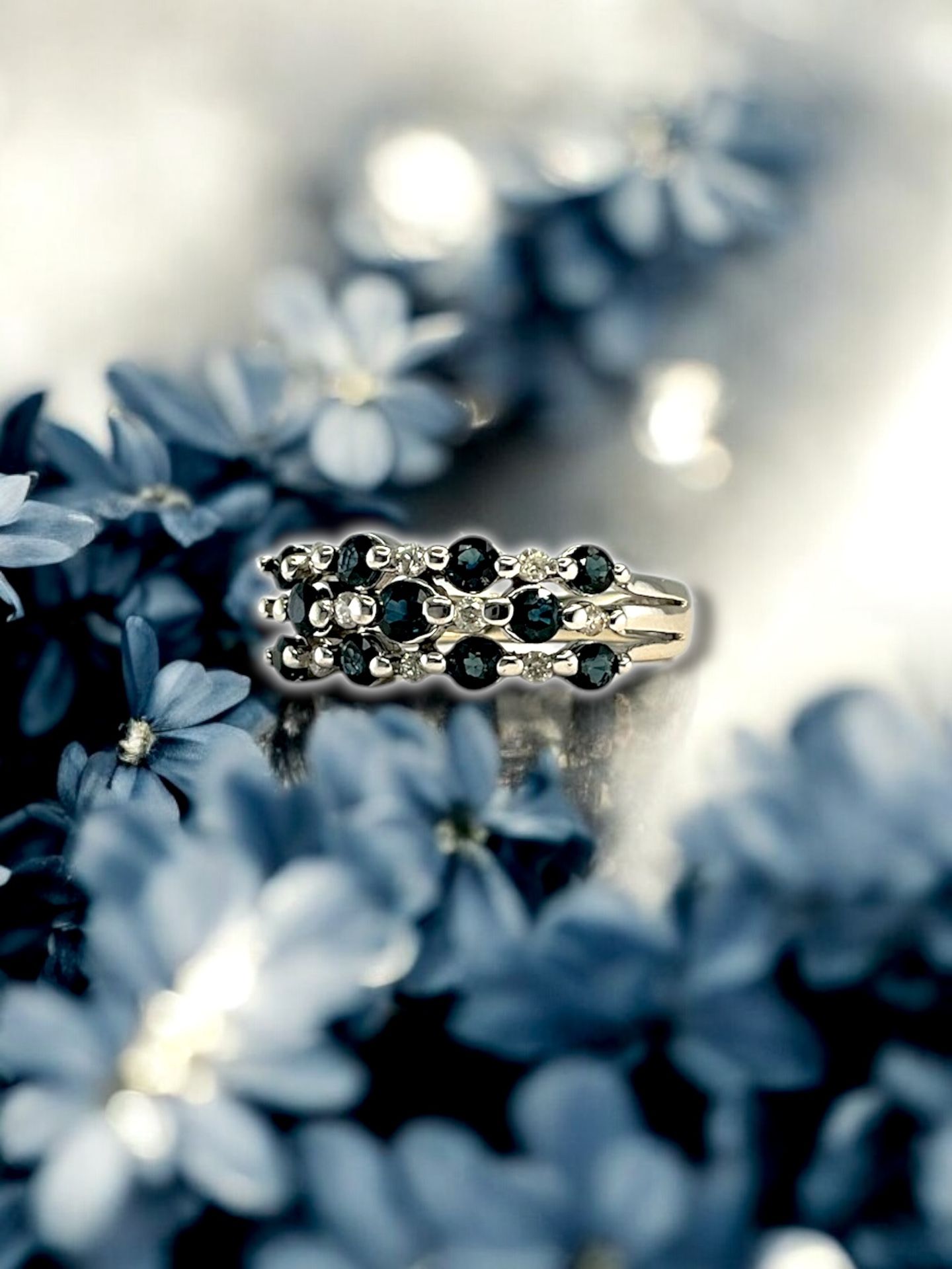 14kt White Gold with Small Round Diamonds and Blue Stones Ring.