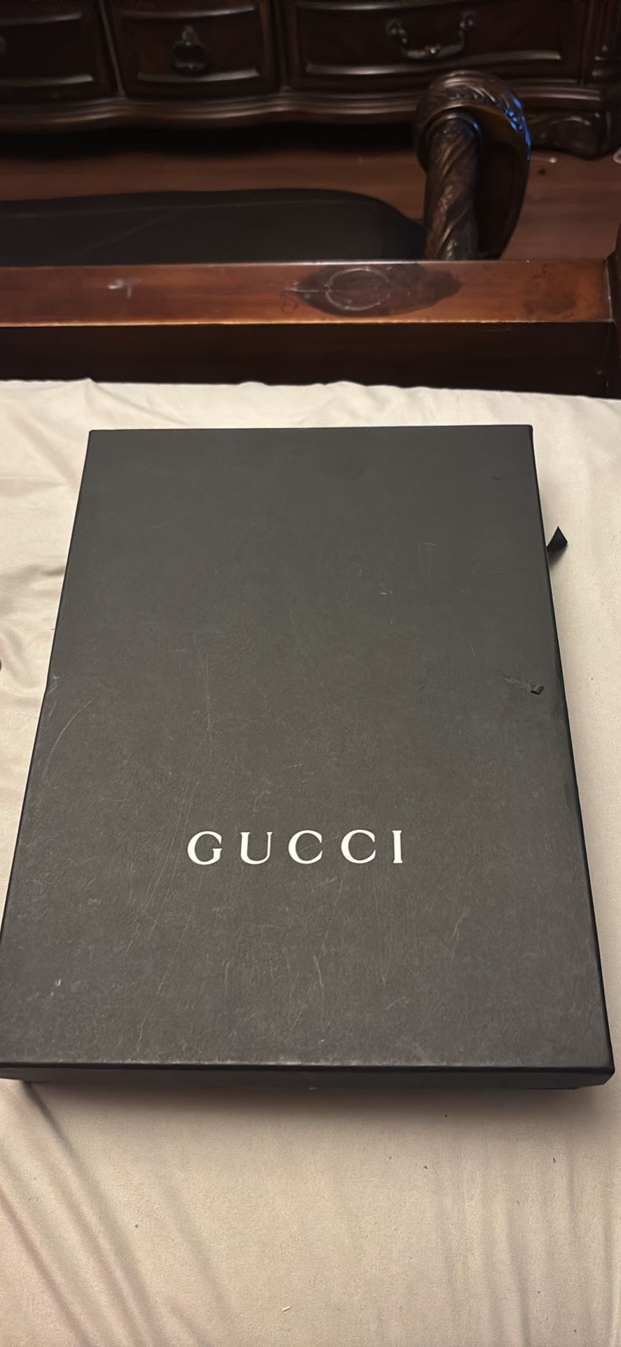 Gucci Microguccissima black leather clutch.
