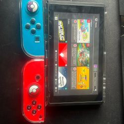 Nintendo Switch 1 Red+Blue joycons, case, dock, and charger