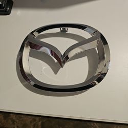 08-15 Mazda 5 Front Bumper Chrome Emblem
