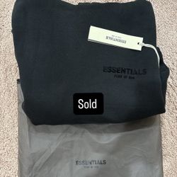 Yeezy Slides And Essential Hoodies For Sale