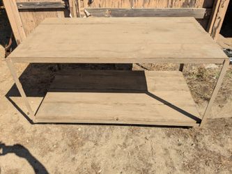 Work/storage table steel and wood is on Wheels
