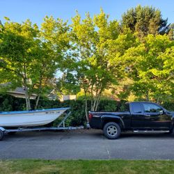 13 ft Livingston Boat, Motor And Trailer