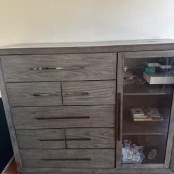 Dresser with glass door