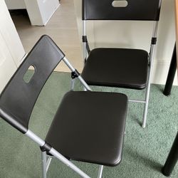 4 Foldable Black Chairs