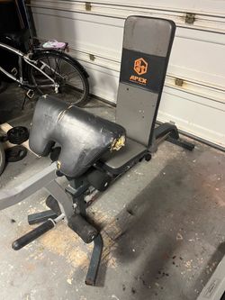 Adjustable bench with leg extension