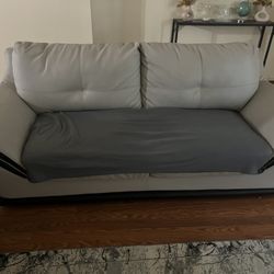 Grey loveseat and sofa 