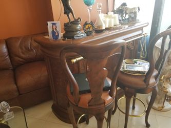 Wooden bar with stools