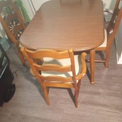 Wooden Table With Four Chairs To Match