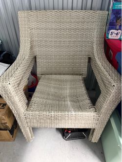 2 wicker like chairs