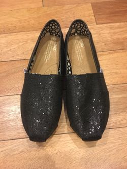 Brand new black glitter Tom’s woman size 6.5