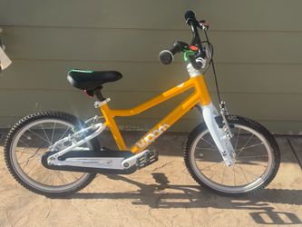 Woom 3 16 inch light weight all aluminum kids bike in like new condition only used a few times