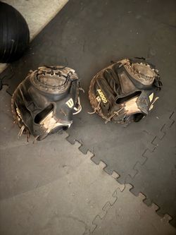 2 Wilson a2000 33.5 Catcher Gloves