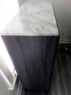 White marble finish top , Dark Expresso/ dark brown wood finish clothes cabinet 4 drawers