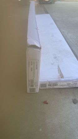 2 boxes of flooring planks