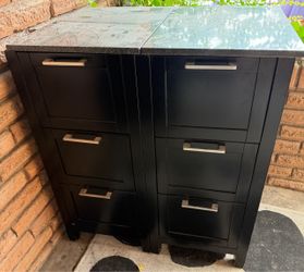 Black stand with granite top