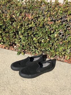 Vans - black slip ons