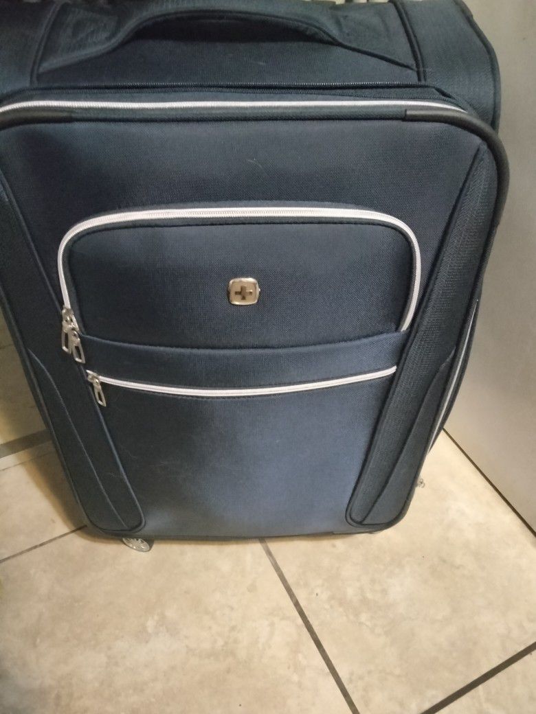 Brand New Swiss Made Rolling Soft Side Suit Case