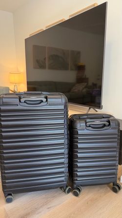DELSEY 28” + 20” Hardshell Luggage Set – $80 for Both