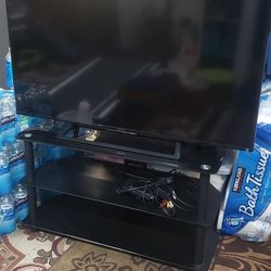 T.V and stand together 