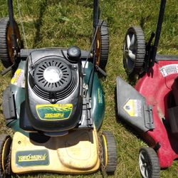 2 Lawnmowers Honda And Husky