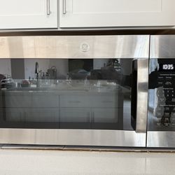 GE JVM6172SKSS 1.7 Cu. Ft. Over-the-Range Microwave Oven Stainless Steel Bundler