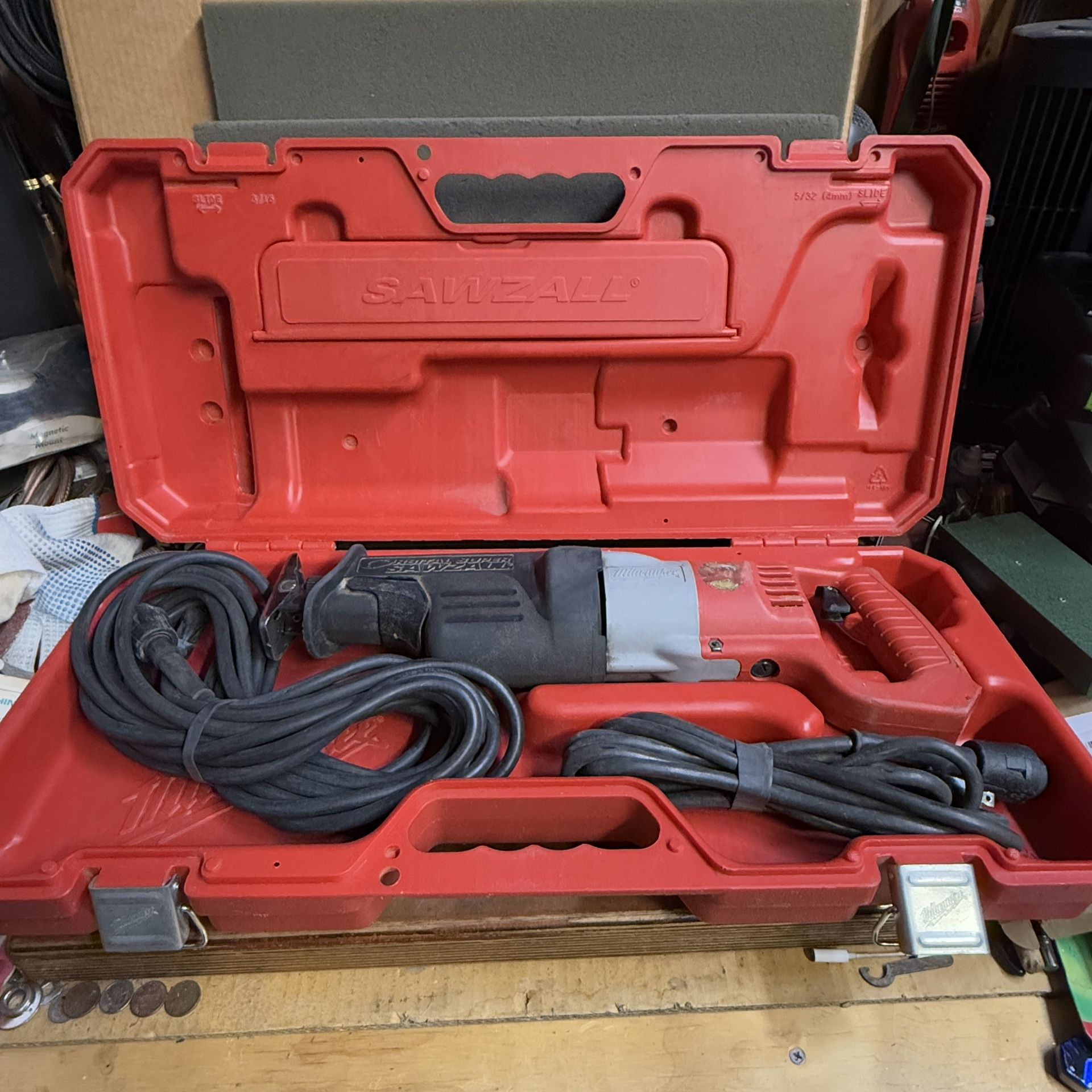 Milwaukee Super Orbital Sawzall 6521-50 with 2 cords and several nice blades.