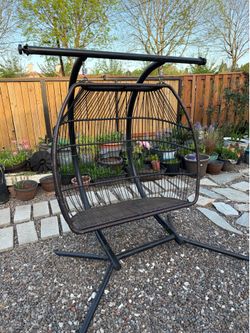 Two Seater Patio Swing Located in Beaverton By Washington Square Mall