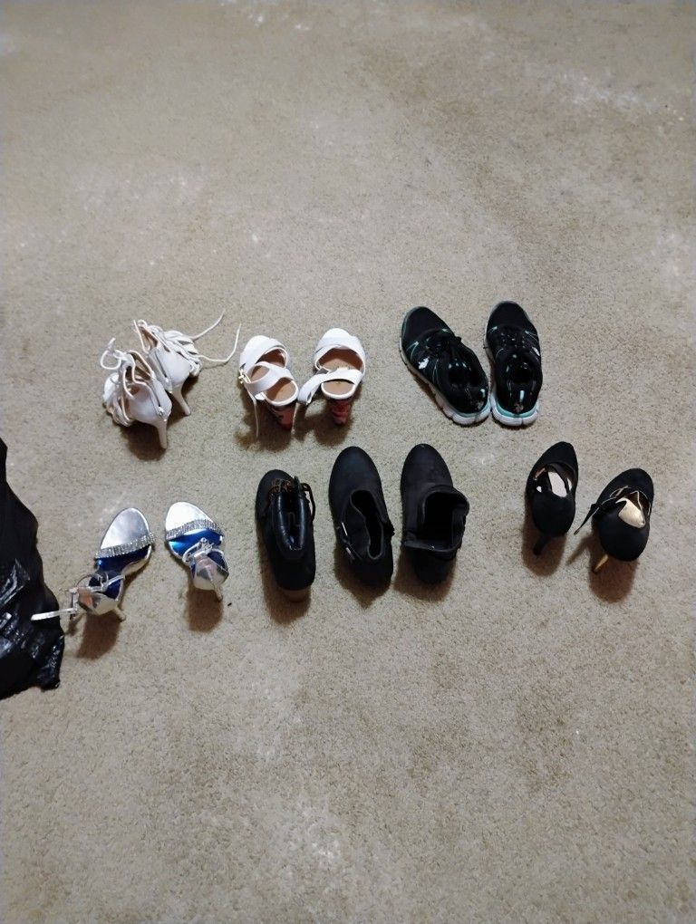 HUGE BAG OF ALL KINDS OF WOMEN'S SHOES