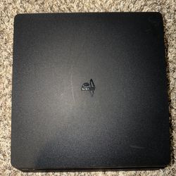 PlayStation 4 Slim 1TB + 2 DualShock Controllers – Excellent Condition 