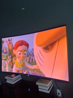 Samsung  Curved Flat Screen TV 65”