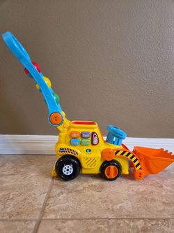 Toy Bulldozer with lights,  sounds and 4 balls