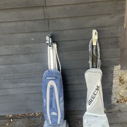Two Oreck Vacuums