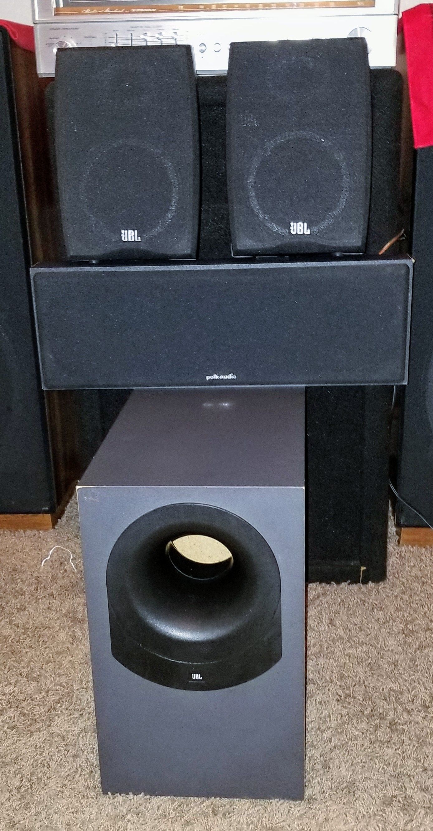 Two JBL Bookshelf & one center Polk Audio & one JBL Subwoofer