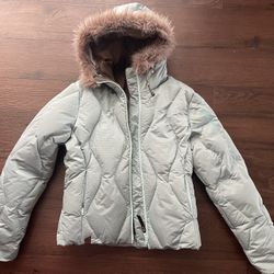 Woman’s Ski/Winter Jacket Salomon, Size M, runs smaller  Like new