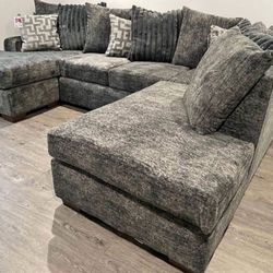 BRAND NEW GRAY OVERSIZED SECTIONAL – ONLY $995! Get this AMAZING deal today! Super comfy, modern design, and perfect for any living room. Limited sto

