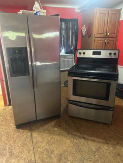 Stainless Steel Refrigerator and Electric Range Set