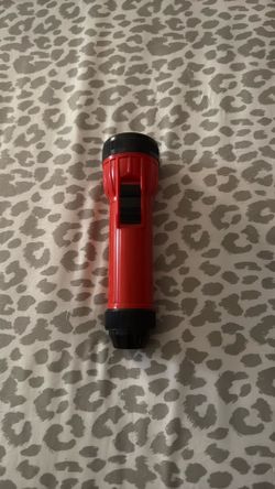 A red flashlight