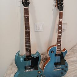 2 Blue Gibsons....$1800