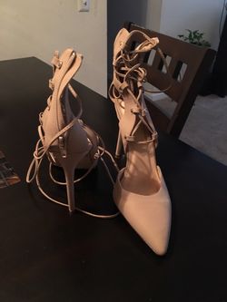 Tan strap up pumps