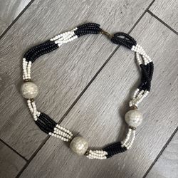 Vintage black and white beaded necklace with accents