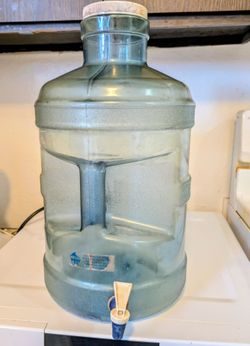 4 plastic water jugs