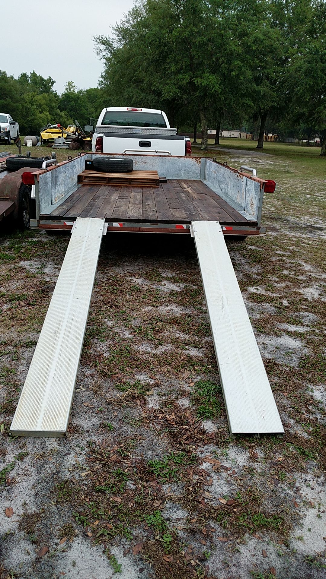 6'6"wide x 12'long trailer with 3500lb easy lube axle with ramps