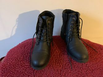 Brand new boots size 8.5 with 2 side zippers 1 to put credit card into $25.00
