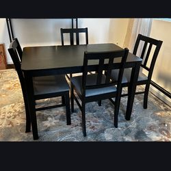 Table plus 4 chairs excellent condition