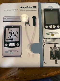 Alpha-Stim AID cranial electrotherapy stimulator