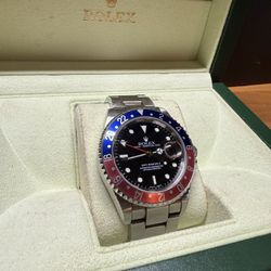 Rolex GMT-Master II 16710 “Pepsi” with original box. 